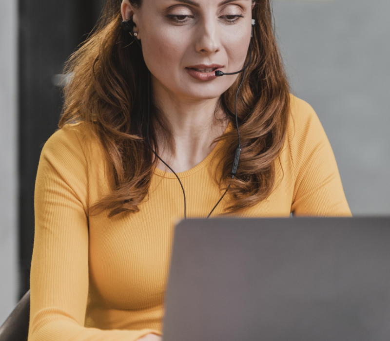 medium-shot-woman-streaming-with-laptop